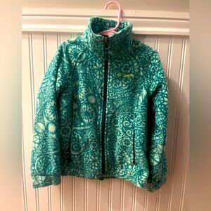 Like new Columbia fleece jacket with teal pattern size XS (6/6x)